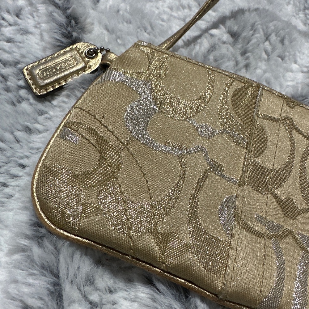 Coach gold and silver wristlet